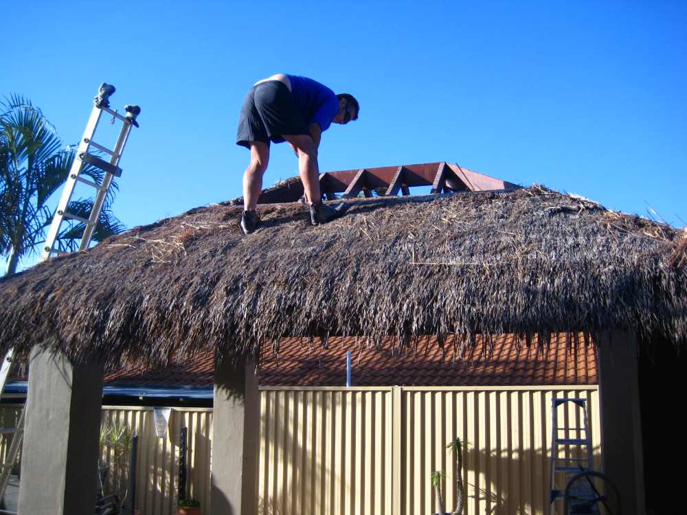 Bali Hut Thatch to Shingles Conversion Bali hut thatch replaced with roof shingles