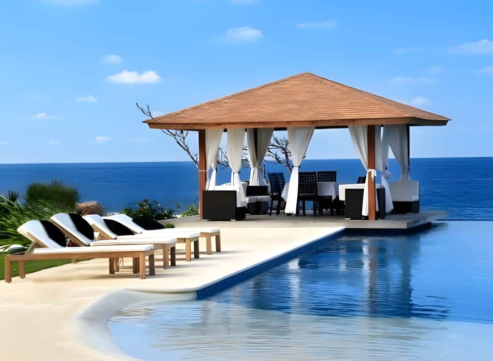 Poolside cabana with asphalt shingle roof in Adelaide