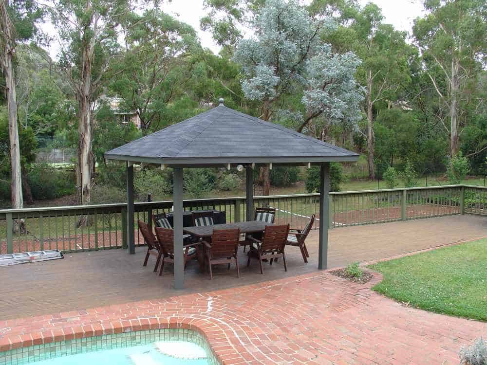 DIY gazebo roof installation with asphalt shingles - completed project in Australian backyard