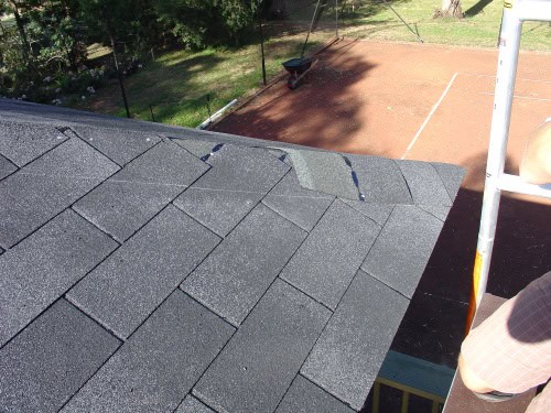 Hip Capping Installation Installing hip capping on DIY gazebo roof with asphalt shingles