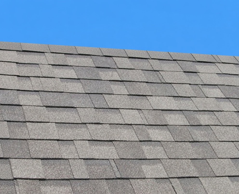 Weatherwood Laminated Asphalt Shingles Close Up Close-up of premium laminated weatherwood asphalt shingles showing texture and colour