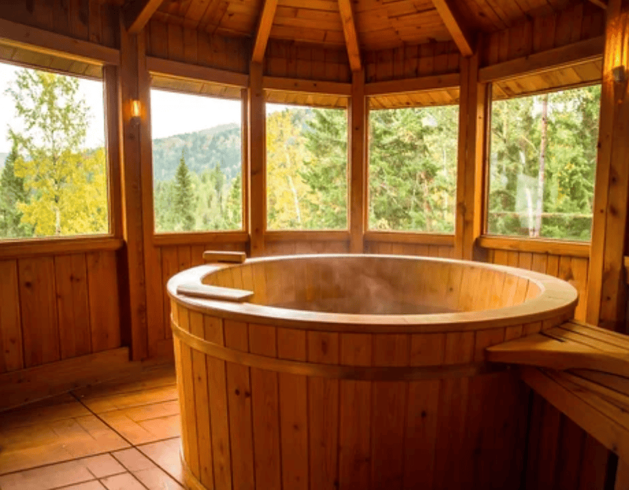 Outdoor Gazebos Australia 32 Luxury round wooden hot tub inside a light cedar spa gazebo with large windows overlooking autumn mountain forest view, perfect for relaxation and wellness