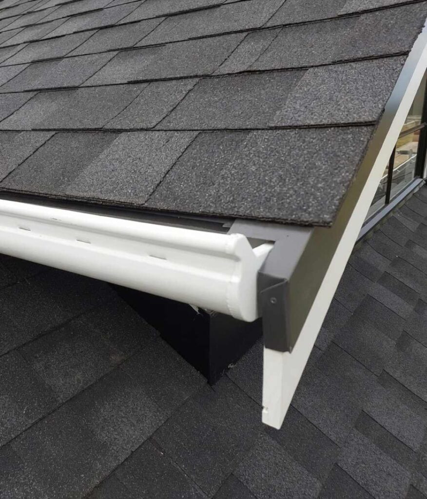 Carport Kits With Premium Shingle Roofs – Beautiful &Amp; Built To Last 4 Close-up of gable edge flashing details on premium dual black asphalt shingle roof for carport kits
