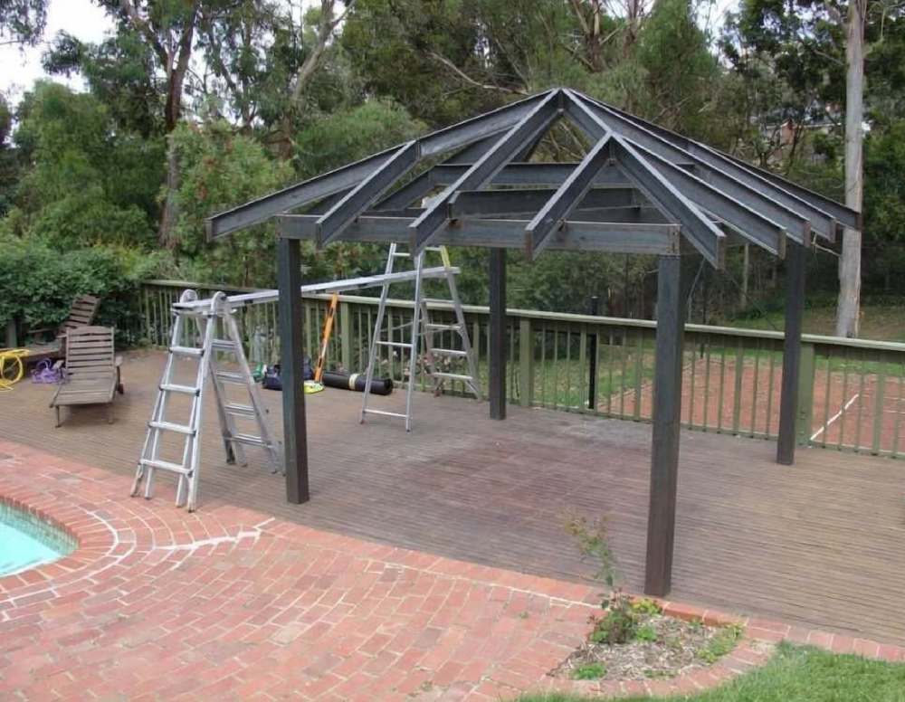 Fire-Resistant Asphalt Shingle Roofing System For Bal Zones 6 Bare metal steel framing for a gazebo structure, showing open rafters and posts - ideal base for fire-resistant roofing in bal zones